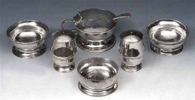 Appraisal: A COLLECTION OF SILVER ARTS CRAFTS BEATEN TABLEWARE comprising two