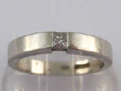 Appraisal: A platinum and diamond solitaire ring the rectangular channel set