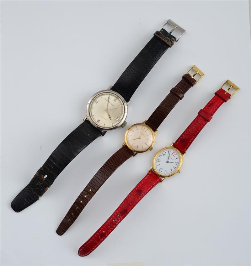 Appraisal: THREE WRISTWATCHES Comprising a lady's k gold oval watch Asprey