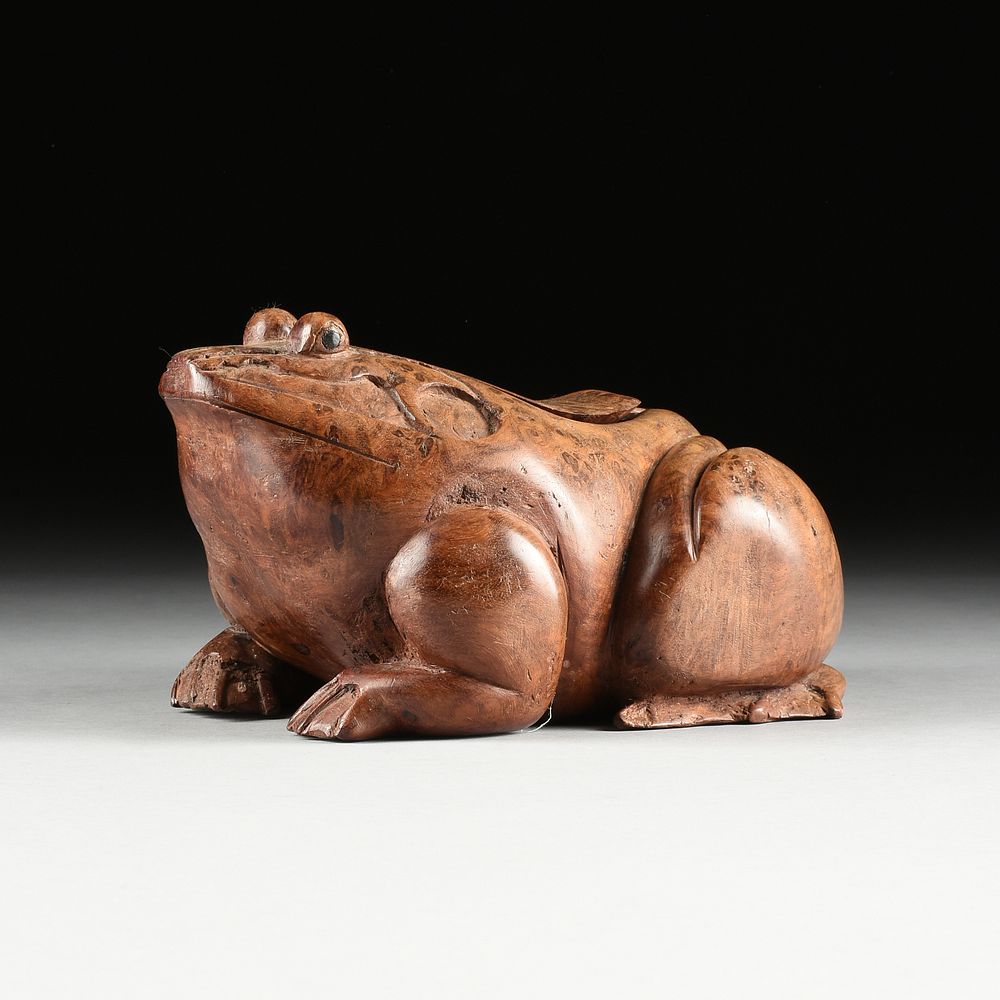 Appraisal: A SOUTH EAST ASIAN CARVED BURL WOOD FROG FORM BOX