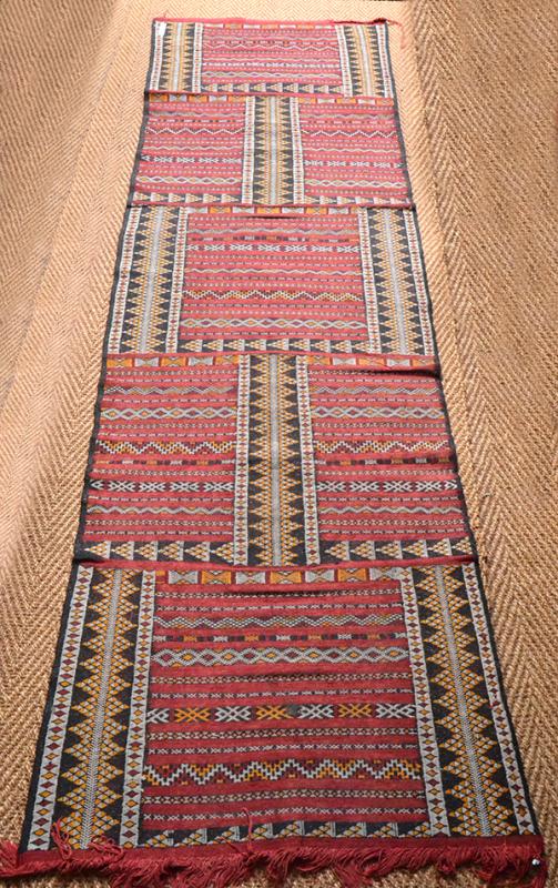 Appraisal: A SMALL AFGHAN TRIBAL RUG with a central diamond lozenge