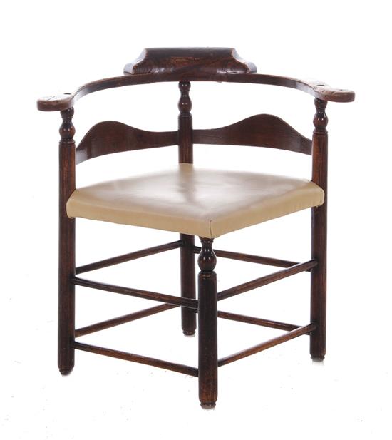 Appraisal: English mahogany Windsor corner chair circa scrolling armrest arched splats