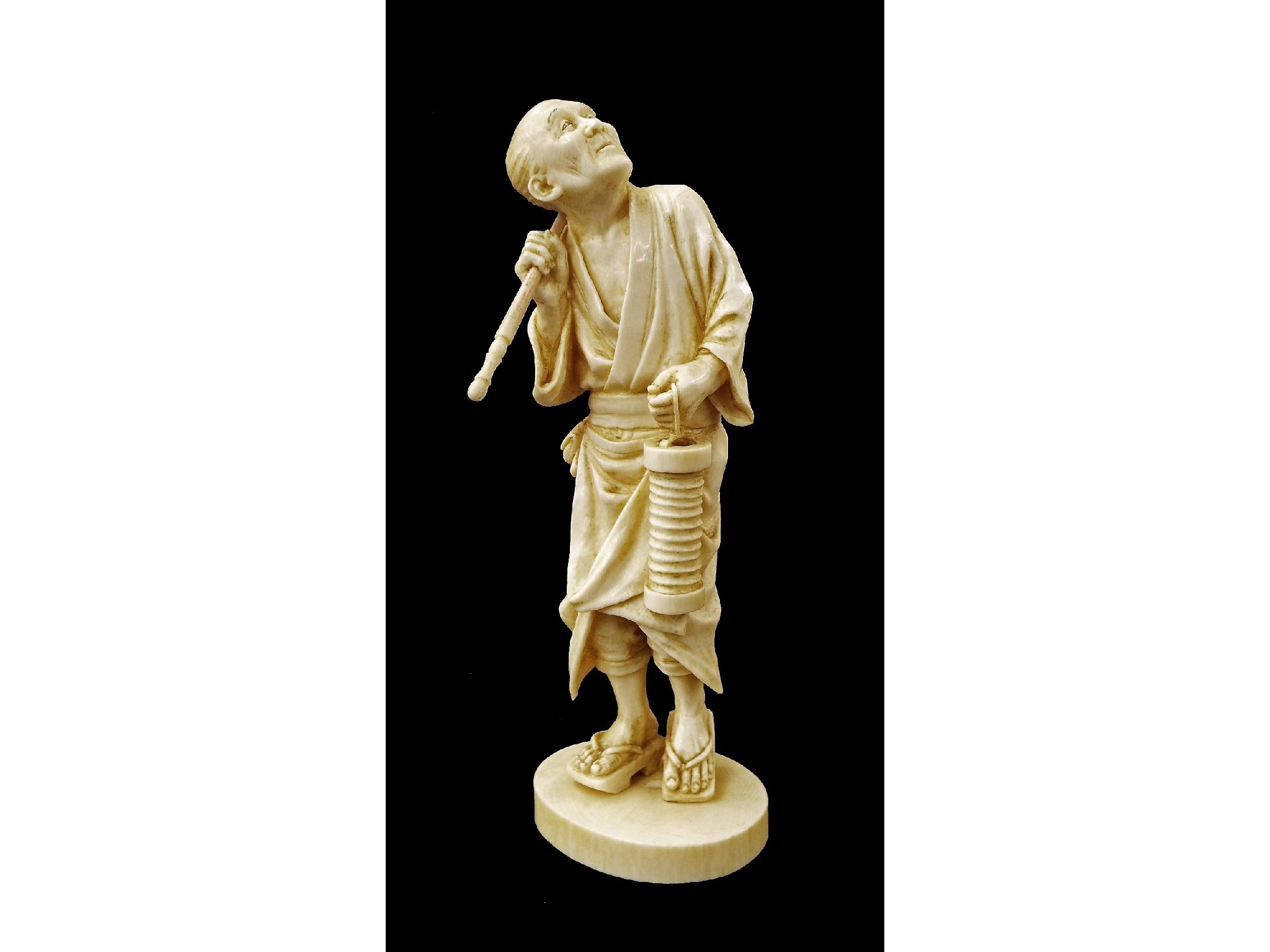 Appraisal: Japanese ivory okimono signed Mitsutaku carved and modelled as a