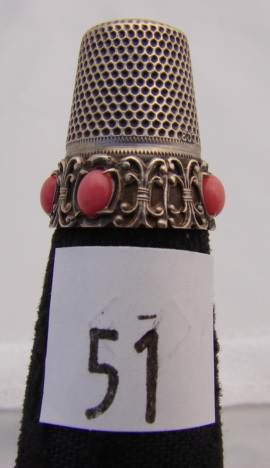 Appraisal: German silver thimble with pink stones on band