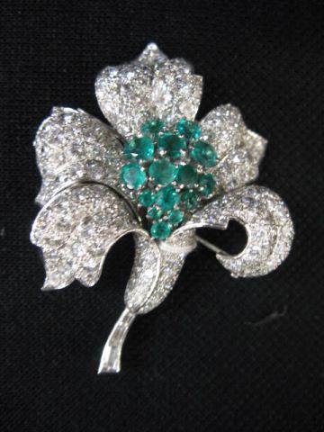 Appraisal: Emerald Diamond Brooch round diamonds totaling carats and round emeralds