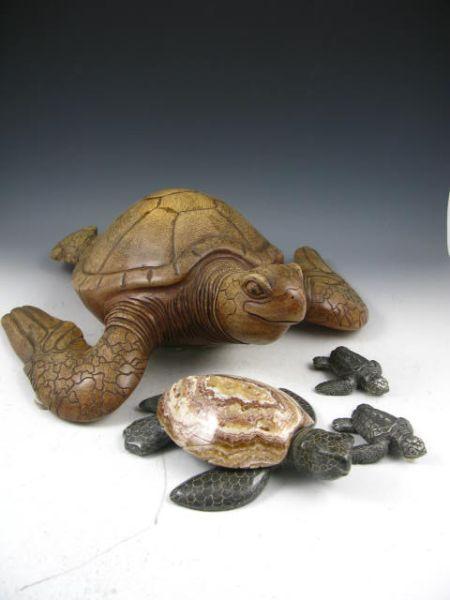 Appraisal: Group of Four Tortoises one handcarved wooden x in one