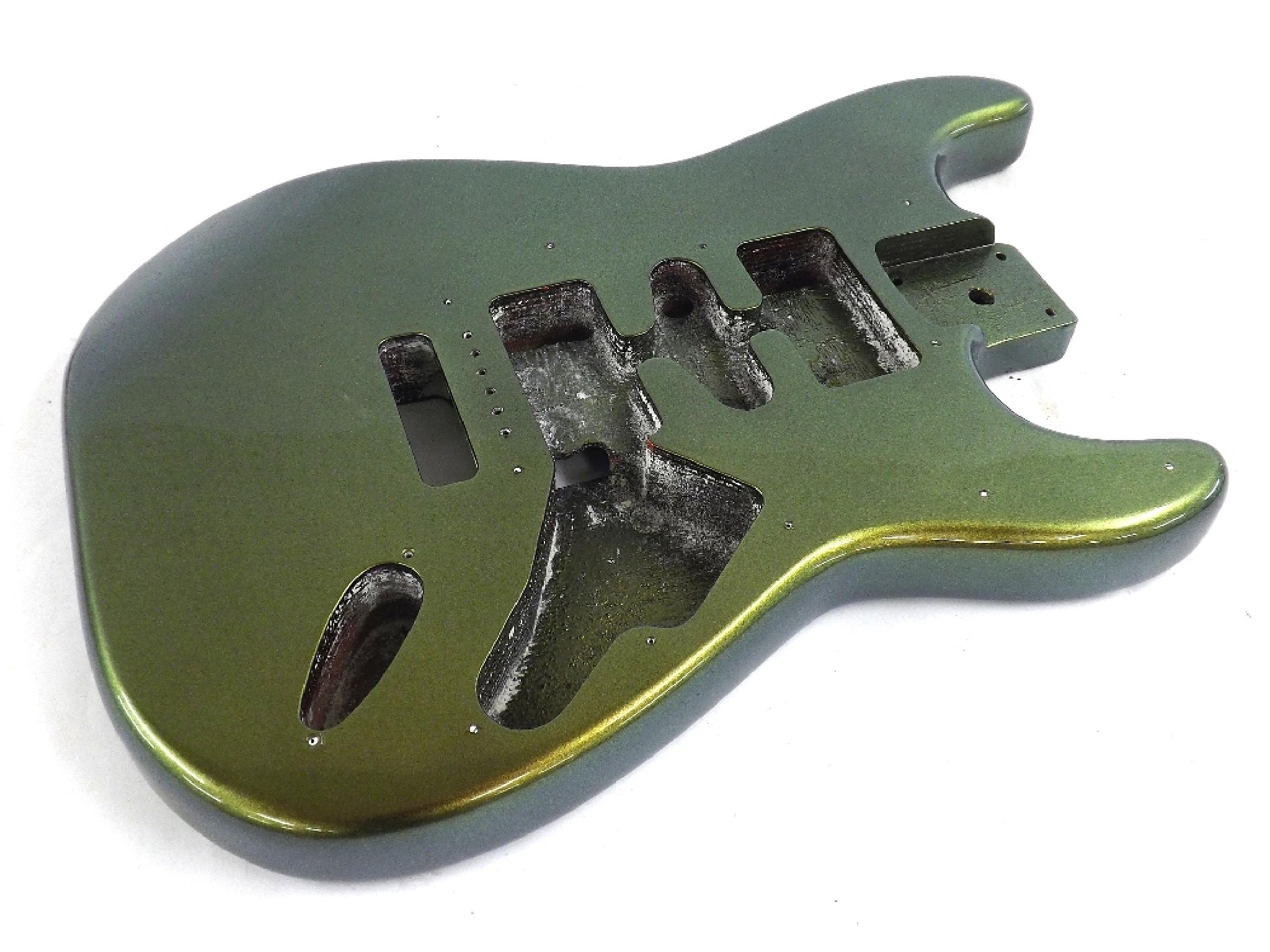 Appraisal: Stratocaster style guitar body with custom metallic green flip paint