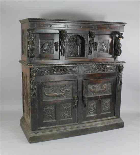 Appraisal: A Victorian carved oak court cupboard of th century design