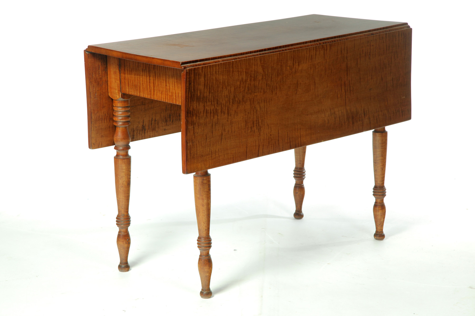 Appraisal: LATE SHERATON TIGER MAPLE DROP LEAF TABLE American nd quarter-