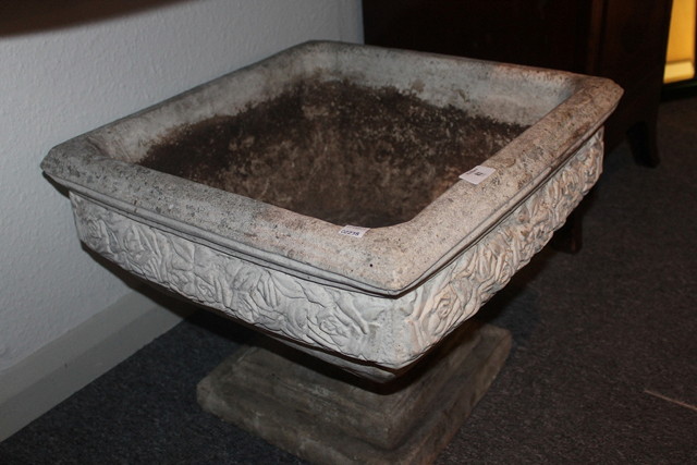 Appraisal: A RECONSTITUTED STONE GARDEN URN of square cut form on