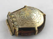 Appraisal: An impressive Scottish sporran shaped brass bound leather vesta case