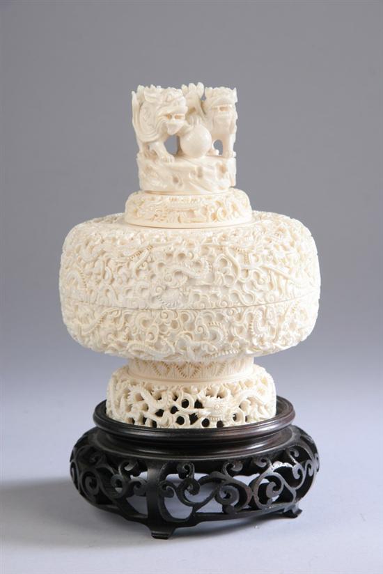 Appraisal: CHINESE IVORY BOX AND COVER Fu-dog form finial carved to