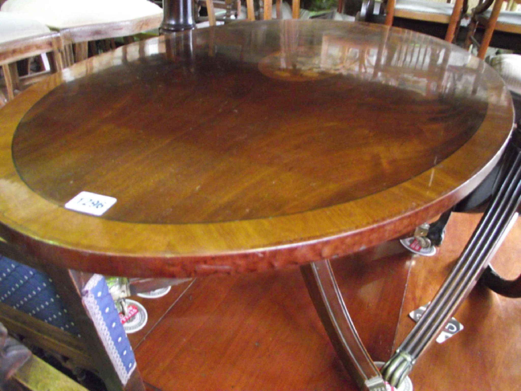 Appraisal: A Georgian style occasional table the oval crossbanded top with