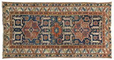 Appraisal: Caucasian rug three central medallions on blue field ivory highlights