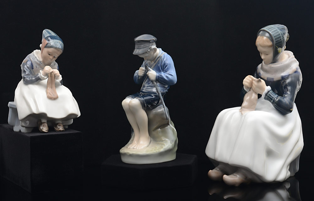 Appraisal: ROYAL COPENHAGEN PORCELAIN FIGURINES WOMAN KNITTING signed under glaze ''L