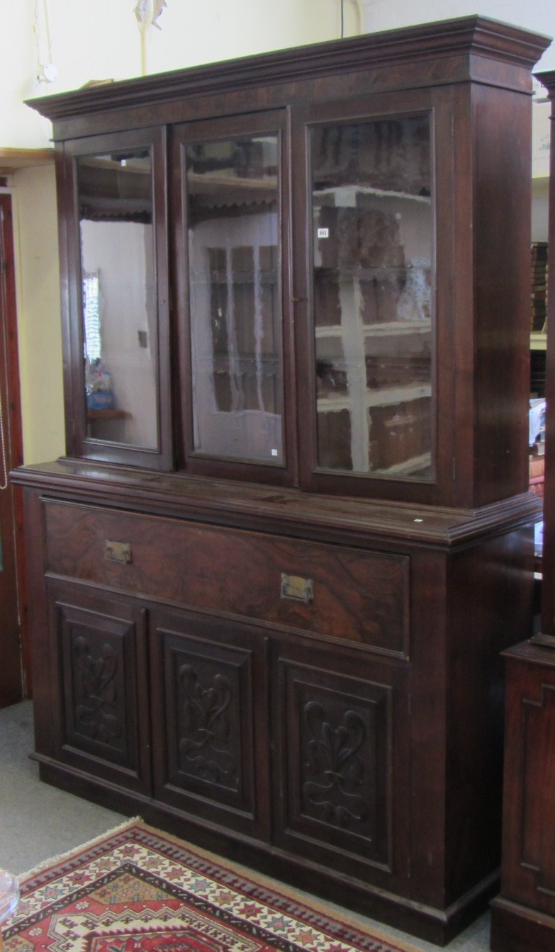 Appraisal: A Victorian walnut bookcase secretaire cupboard the three glazed doors