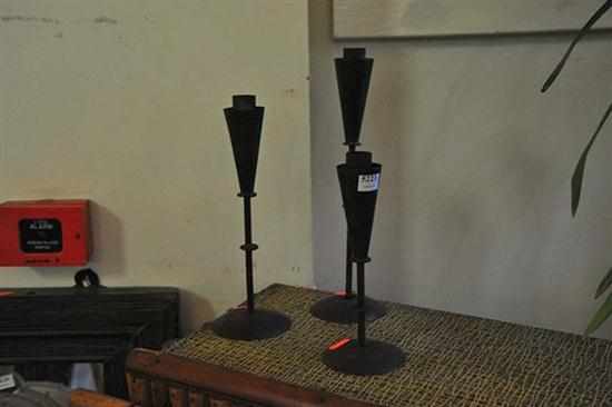 Appraisal: A SET OF THREE IRON CANDLE HOLDERS