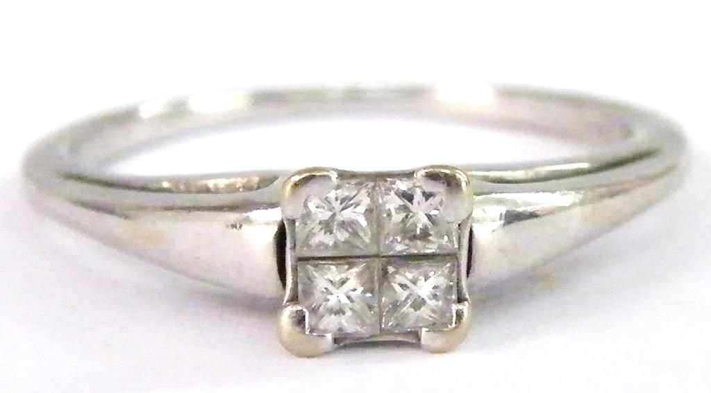 Appraisal: ct white gold princess cut four stone diamond ring in