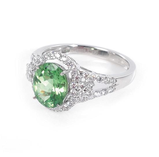 Appraisal: Tsavorite and diamond ring ct oval natural green tsavorite garnet