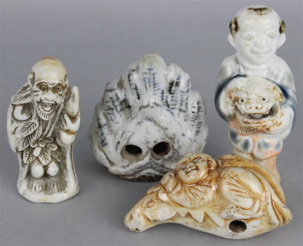 Appraisal: FOUR JAPANESE HIRADO NETSUKE the first molded as a flaming