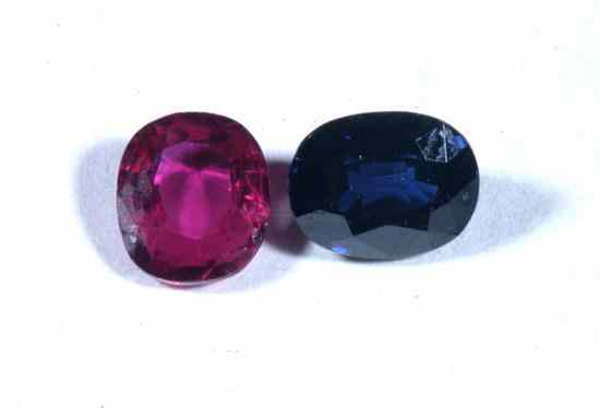 Appraisal: TWO UNMOUNTED OVAL PRECIOUS GEMSTONES One ruby one sapphire Each