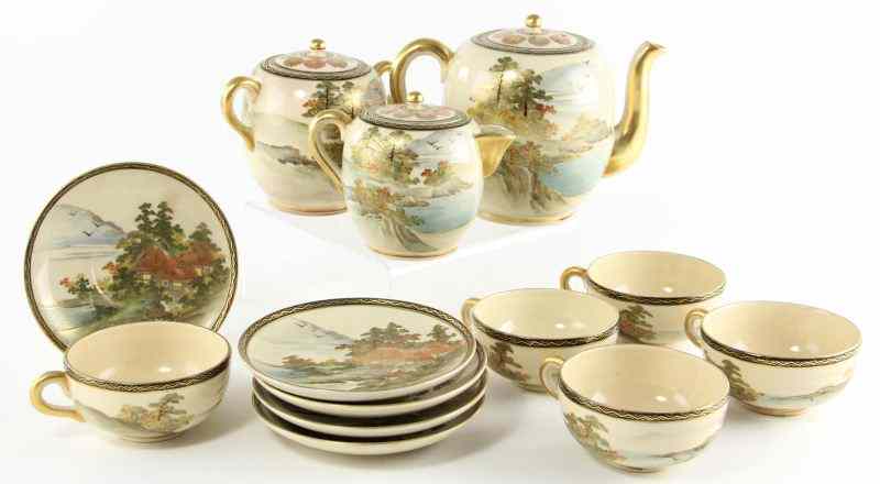 Appraisal: Japanese Satsuma Tea Set pieces including teapot lidded creamer and