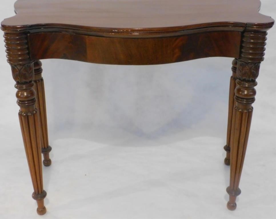 Appraisal: EARLY TH CENTURY AMERICAN TRANSITIONAL SHERATONshaped front mahogany card table