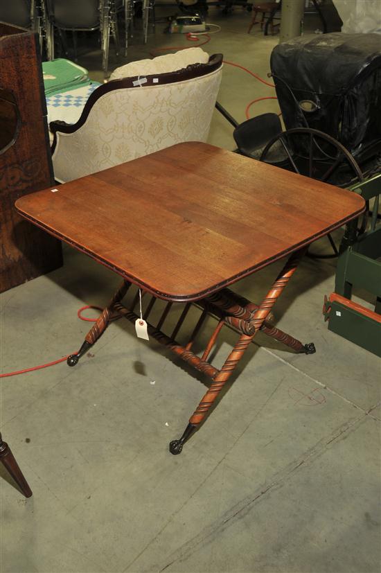 Appraisal: FOLDING TABLE Mahogany with rounded corners ropetwist turned folding base