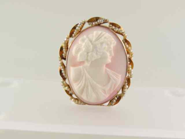 Appraisal: Cameo Brooch or Pendant carved angel skin coral portrait of