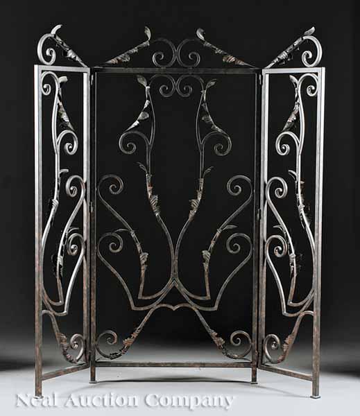 Appraisal: A Three Panel Wrought Iron Screen scrolled and foliate decoration