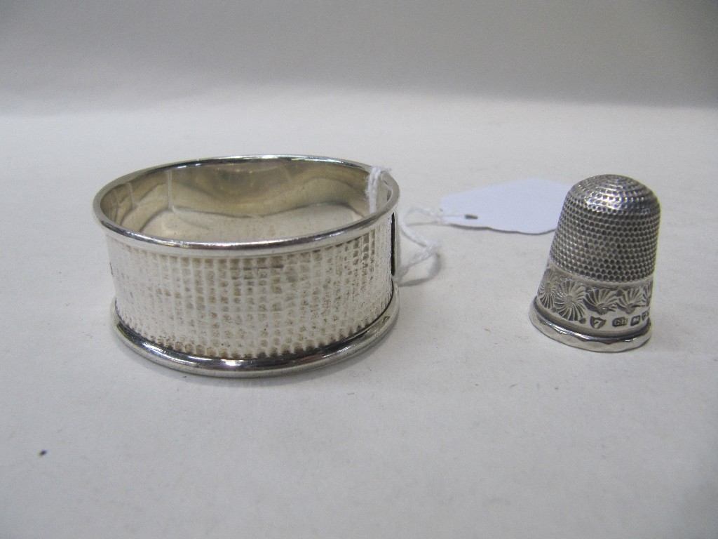 Appraisal: Lot comprising silver napkin ring and thimble by Charles Horner