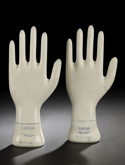 Appraisal: Pair of Glazed White Porcelain Large Glove Molds one example