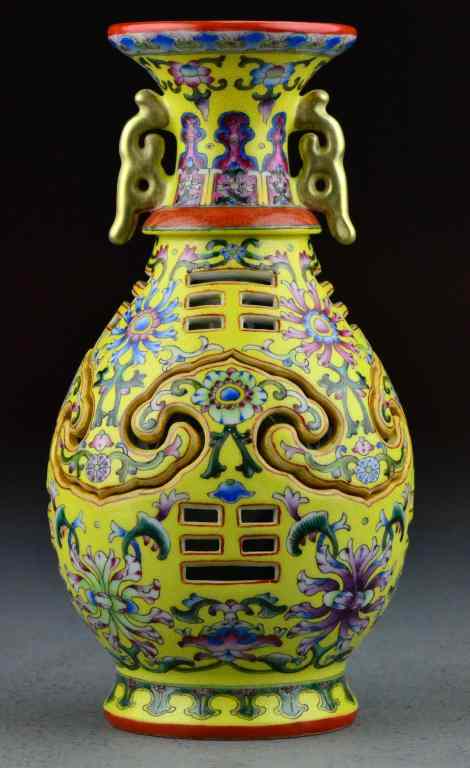 Appraisal: Chinese Famille Rose Porcelain Revolving VaseFinely painted depicting lotus blossoms