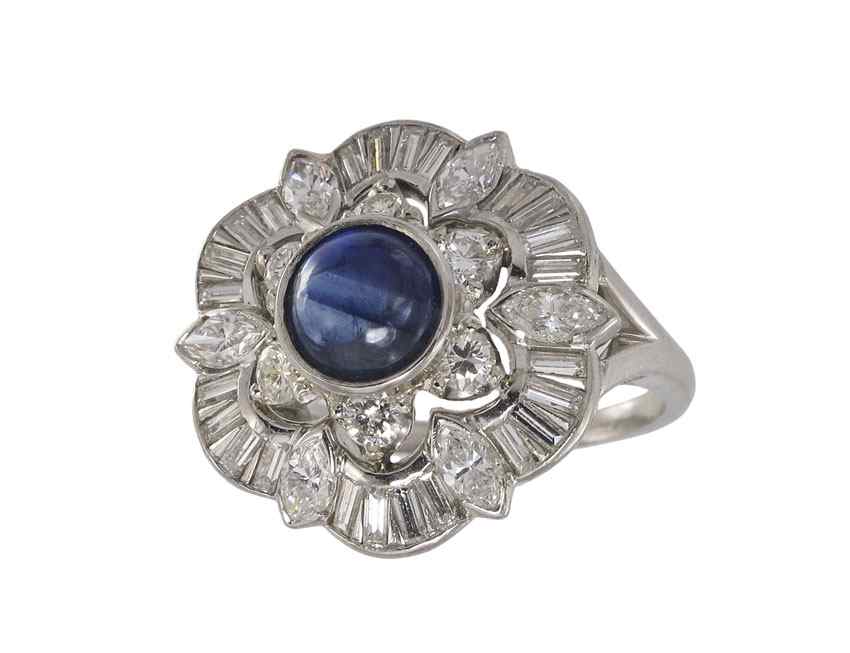 Appraisal: PLATINUM DIAMOND SAPPHIRE RING Platinum ring contains one round cabochon