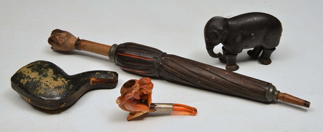 Appraisal: A MEERSCHAUM MINIATURE PIPE in the form of a naked