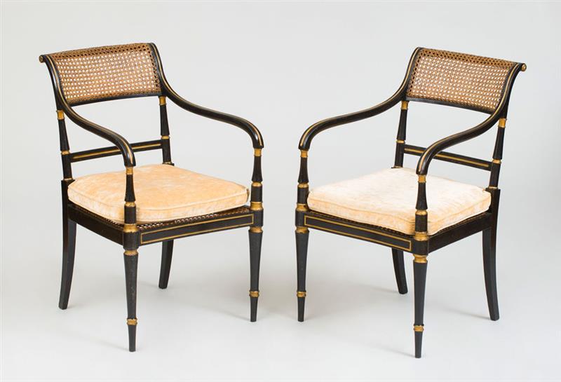 Appraisal: PAIR OF GEORGE III BLACK JAPANNED AND PARCEL-GILT ARMCHAIRS Each