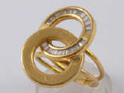 Appraisal: A yellow metal tests ct gold ring designed as two