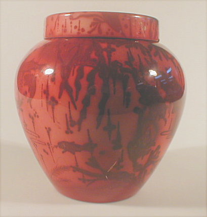 Appraisal: A Bernard Moore flamb glazed ginger jar and cover decorated