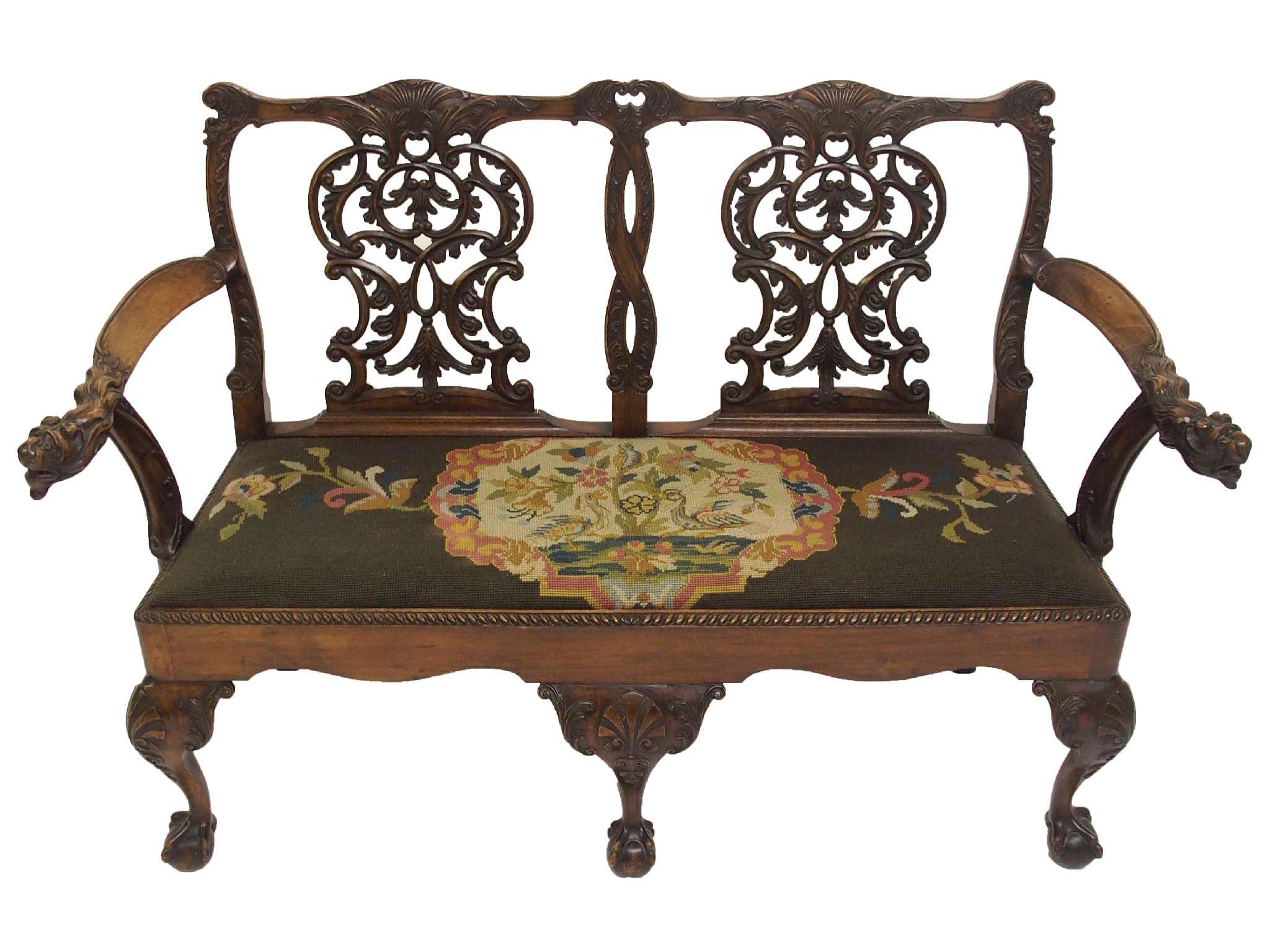 Appraisal: A Chippendale style mahogany small two seater setteewith pierced foliate