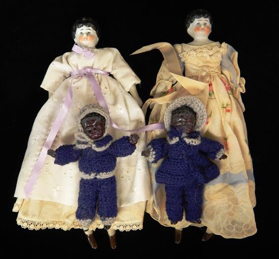 Appraisal: DOLLS Four pieces two low-brow China dolls with ceramic heads