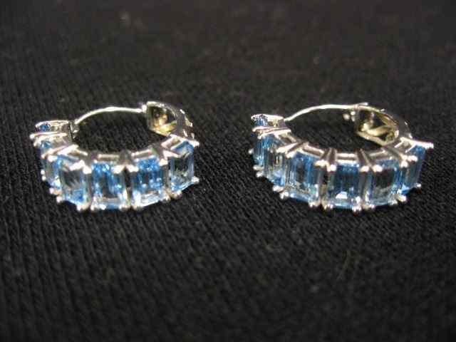 Appraisal: Blue Topaz Earrings six emerald cut gemsin each hoop style