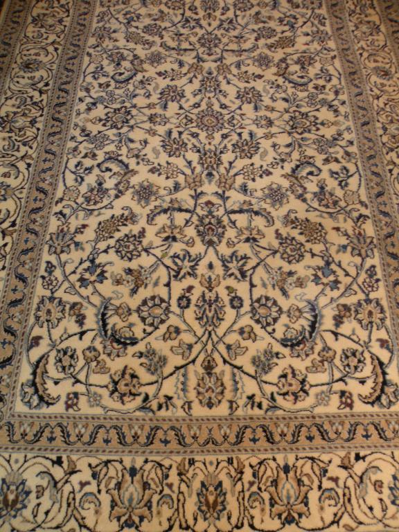 Appraisal: An eastern pattered carpet with a design of flowers and