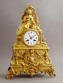 Appraisal: French Gilt Bronze Figural Mantel Clock mid th c surmounted