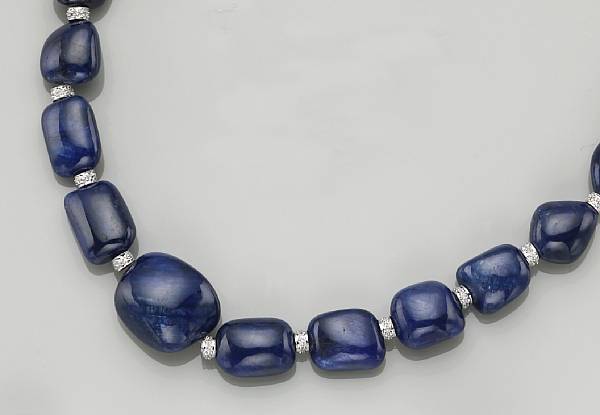 Appraisal: A sapphire nugget diamond and fourteen karat white gold necklace