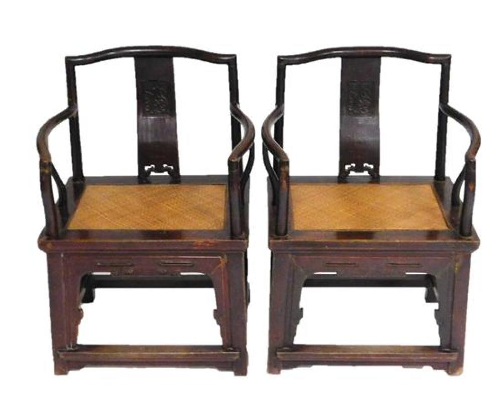 Appraisal: ASIAN Pair of Chinese armchairs th C serpentine crest rail