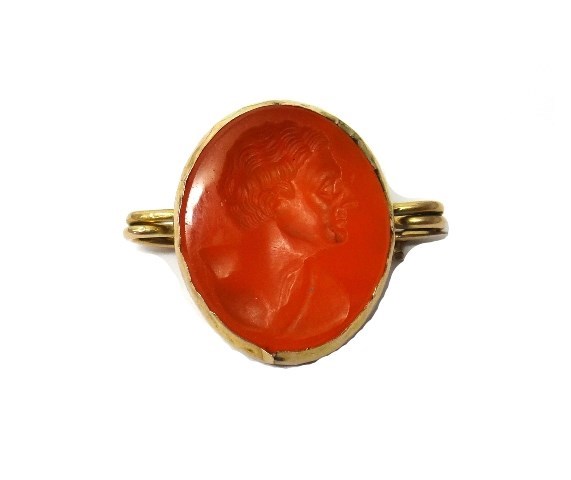 Appraisal: A gold mounted oval carved cornelian intaglio carved as the