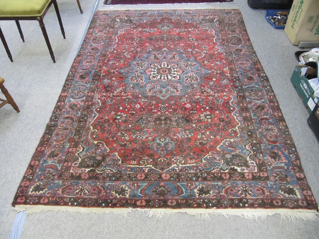 Appraisal: Eastern floral floor rug on a red white and blue