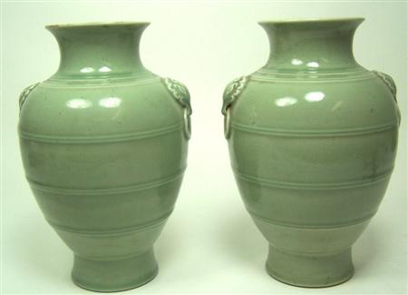 Appraisal: A pair of th century Chinese celadon vases each of