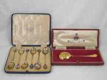 Appraisal: A cased set of six enamelled silver gilt teaspoons commemorating