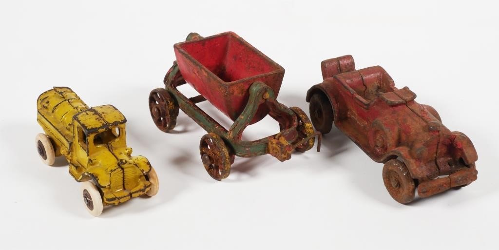 Appraisal: Three cast-iron vehicles 's vintage as follows Red - -seater